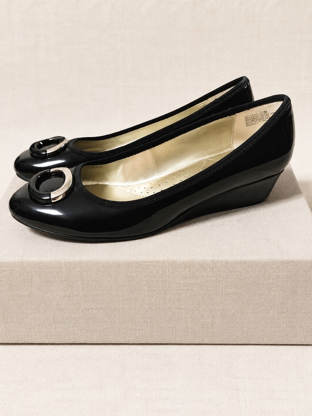 Bandolino Black Patent Wedge Pumps with Silver Circle Accent
